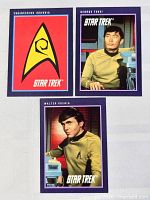 Fronts of three Star Trek cards: Engineering Insignia, George Takei, Walter Koenig