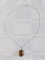 Full view of necklace with pendant attached