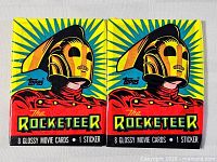 Front view of both sealed Rocketeer trading card packs
