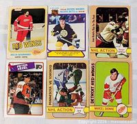 All six hockey cards laid out together