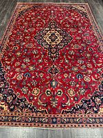 Full view of rug showing entire pattern and border