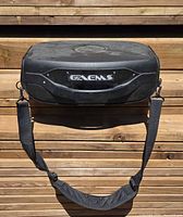 Front view of GAEMS case showing logo panel and attached shoulder strap