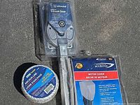 Transom saver, anchor line spool, motor cover in packaging