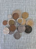 Group view of all seventeen world coins