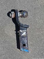 Side view of ball mount showing overall length, drop, attached ball