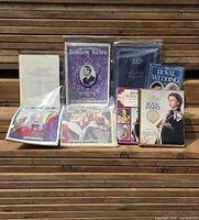 Group shot of all eight publications in sleeves