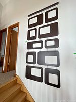 Full view of wall art above stairs