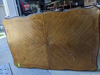 Top view showing wood grain pattern and overall tabletop condition