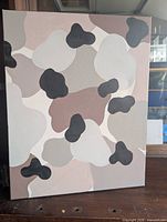 Front view of cow-pattern canvas