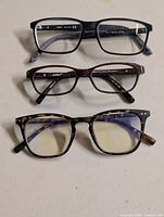 Three eyeglass frames front view