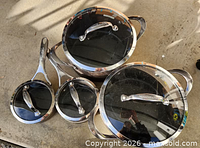 Top view of all four pots with lids