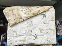 Overall view showing both sides of reversible comforter