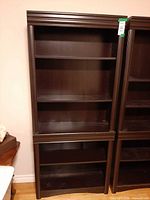 Front view of Sauder Palladia bookcase showing shelves and moldings