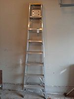 Full front view of 8-ft aluminum step ladder