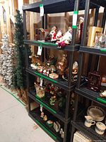 Full view of Rimax five-shelf black resin rack