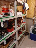 Front view of beige plastic rack showing five ventilated shelves