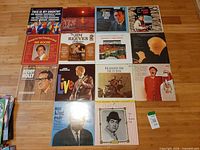 All 12 record jackets laid out in 3×4 grid