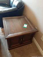 Angled view of end table beside sofa