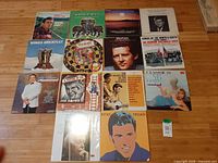 All 12 LP records laid out in three-row grid