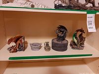 Shelf view of all five dragon themed items
