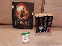 Group shot of hardcover annual and four paperback novels