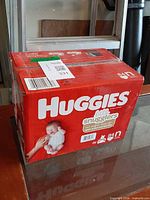 Front angle of sealed diaper box on table