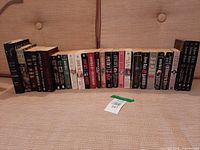 Full row of Anne Rice novels on couch