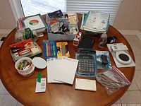 Overall view of all office and school items on table