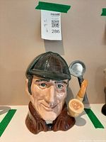 Front view of Royal Doulton Sherlock Holmes toby jug