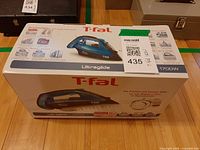 Sealed retail box front showing model and power rating