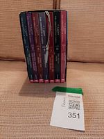 Front view of books in slipcase with bookmark