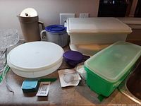 Overview of all Tupperware pieces on counter
