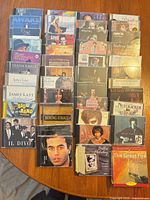 Overhead shot of all CDs and audio book arranged on table