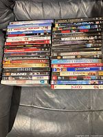 All 35 DVD cases stacked showing visible titles