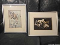 Front view of both framed prints on couch