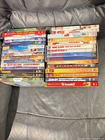 Two stacks of DVD cases showing spines with movie titles