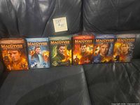 Front view of all six MacGyver DVD box sets arranged sequentially