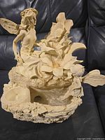 Full view of Partylite Ariana fountain showing fairy figure, flowers and basin