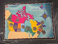 Front view of sealed Canada 125 map card with twelve 25-cent coins
