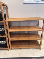 Wide view of both wood racks side by side