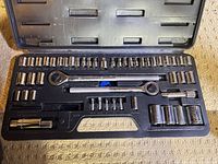 Open Craftsman socket set showing sockets, ratcheting handles, bits and accessories in molded tray