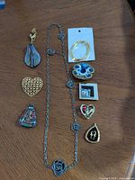 All ten jewelry items arranged on table