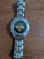 Front view of titanium two-tone chronograph wristwatch