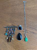 Group shot of all four jewelry pieces laid out