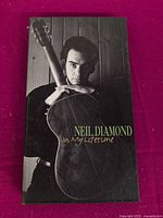 Front of slipcase showing Neil Diamond portrait and title