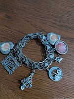 Full view of charm bracelet showing all charms and chain
