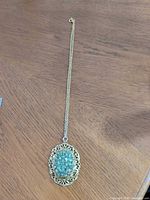 Full view of necklace showing chain length and pendant