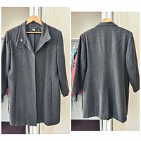Front view of gray charcoal peacoat on hanger showing notched lapel and concealed button placket