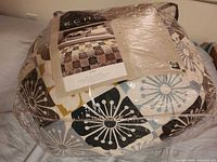 Packaged Echo Home comforter showing overall colour and pattern