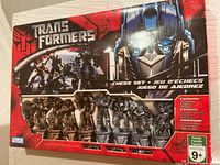 Factory box front showing Transformers branding and window with pieces